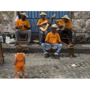  Street Band Wearing Orange Shirts Playing Music on the 