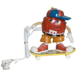   RED M&M STYLE CHARACTER ON SKATEBOARD (Home & Office)