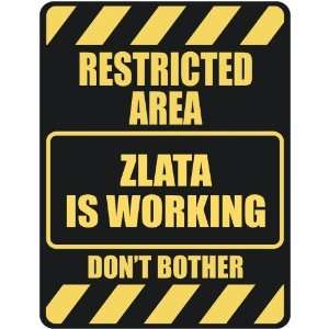   RESTRICTED AREA ZLATA IS WORKING  PARKING SIGN