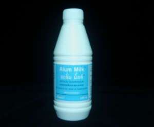 Alum milk stomach carminative antacid suspension pain  