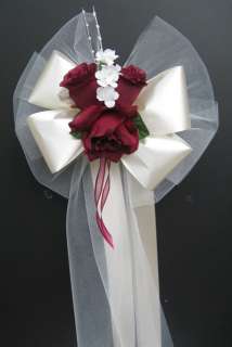 vase table arrangements and pew bows will be made with your choice 