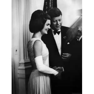  President John F. Kennedy, and Wife Jackie Greeting Guests 