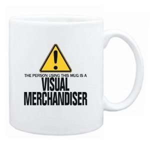  New  The Person Using This Mug Is A Visual Merchandiser 