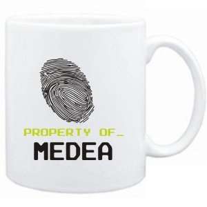 Mug White  Property of _ Medea   Fingerprint  Female 
