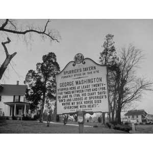  Sign in Tront of a Tourist House Reading Spurriers Tavern 