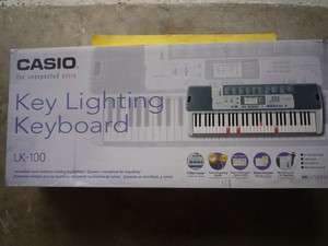 Casio LK 100 Lighted Keyboard HEAVY SCRATCHES SEE PICTURES  