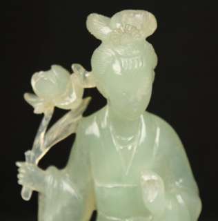 The jade figure measures about 7high (without stand), 3 wide and 2 