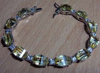 THIS IS A BEAUTIFUL 925 SILVER LEMON AND WHITE TOPAZ BRACELET(7 1/2 