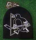 PITTSBURGH PENGUINS KNIT HAT WITH TOP POM AND SIDE FLAPS BY REEBOK