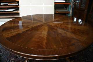 Large round mahogany table with mahogany on mahogany banding