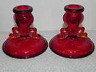 ruby red fenton art glass dolphin handle candle stick holder