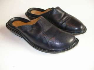   sale is a nice looking pair of womens gently used Clarks mules