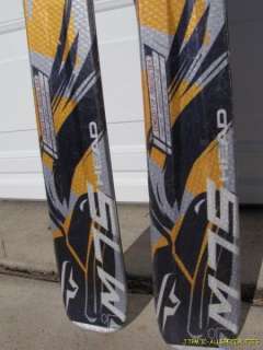 PREOWNED HEAD MONSTER SHAPED DOWNHILL SKIS WITH SALOMON BINDINGS~177 