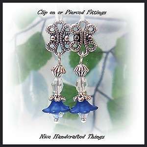   Blue lucite lily and crystal silver earring, clip on or pierced  