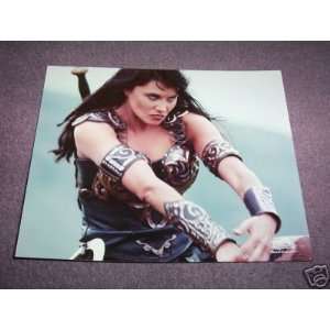    XENA LOOKING FEROCIOUS PHOTO LUCY LAWLESS 