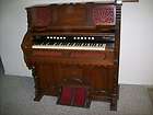 good working antique J. Peterson pump organ w/ oak cabinet